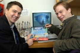 Professor Gerbrand Ceder (left) and research associate Dane Morgan, both of the Department of Materials Science and Engineering, mine for materials with computers.