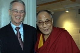 Vest shakes hands with the Dalai Lama, who visited MIT in September.