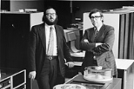Joel Moses and Michael Dertouzos (then associate director and director, respectively, of the Lab for Computer Science) in the laboratory during the mid-1970s.