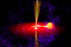 This artist's conception shows the binary system GRS 1915+105, which shows evidence for a wave of spacetime in its accretion disk. A 10 solar mass black hole at the center of the disk pulls gas from a nearby companion star. The gas spiraling into the black hole heats so much that it emits X-ray radiation.