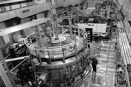 Senior research scientist Jay Kesner stands by the now-operational LDX fusion reactor, in which a series of experiments are being run.