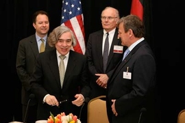 From left, Ian Bowles, Massachusetts Secretary of Energy and Environmental Affairs; Ernest Moniz, director of the MIT Energy Initiative and Cecil and Ida Green Professor of Physics &amp; Engineering Systems; William Hartman, vice president of Fraunhofer USA; and Eicke Weber, director of the Fraunhofer Institute for Solar Energy Systems, sign an agreement to create the MIT-Fraunhofer Center for Sus...