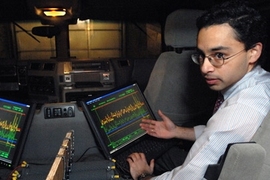 Shakeel Avadhany (Materials Science '09) monitors pressure, position, and generated power sensor data on the custom data acquisition system.