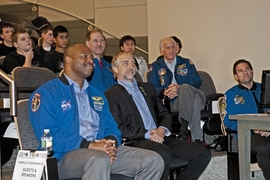 Video game developer and commercial spaceflight supporter Richard Garriott sits with astronauts (from left) Leland Melvin, John Grunsfeld, Jeff Hoffman and Greg Chamitoff.