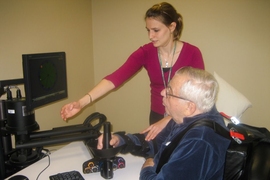 After suffering a stroke, a patient learns to operate the robot MIT-Manus to improve mobility.