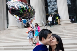 Couple kisses on steps of MIT