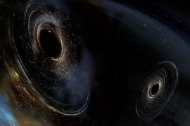 This artist's conception shows two merging black holes similar to those detected by LIGO. The black holes are spinning in a nonaligned fashion, which means they have different orientations relative to the overall orbital motion of the pair. LIGO found hints that at least one black hole in the system called GW170104 was nonaligned with its orbital motion before it merged with its partner.
