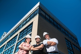 Associate professors Julie Shah, Sertac Karaman, and Amos Winter, in front of the newly renovated Building 31.
