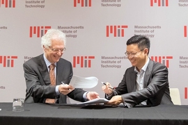 MIT Associate Provost Richard Lester, left, during the launch of the China Future City Lab, Friday, November 17, 2017. Lester welcomed executives from the lab's group of founding partners at a formal signing ceremony.