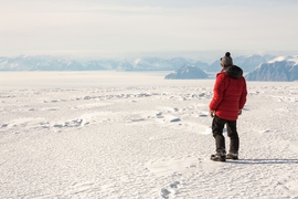 Matt Osman, a graduate student in MIT’s Department of Earth, Atmospheric, and Planetary Sciences, overlooking a frozen Baffin Bay to the west, Nuussuaq Peninsula Ice Cap, west Greenland.  