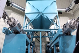 An image of one of Renewlogy's conversion machines. Plastics entering Renewlogy’s system are first shredded, then put through a chemical reformer, where a catalyst degrades their long carbon chains. Roughly 15 to 20 percent of those chains are converted into hydrocarbon gas that Renewlogy recycles to heat the system. Five percent turns into char, and the remaining 75 percent is converted into hi...