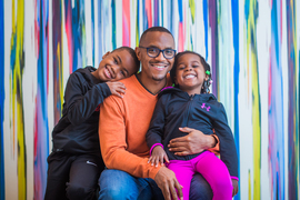 Doctoral student ElDante Winston with his two children