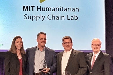 The MIT Humanitarian Supply Chain Lab's Jarrod Goentzel (second from left) receives an ALAN Award.
