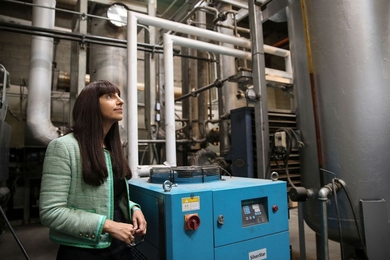 Renewlogy co-founder and CEO Priyanka Bakaya inside one of the company's commercial plants, which are capable of processing ten tons of plastic each day to create about 60 barrels of fuel.
