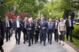 Turkish president Abdullah Gul (right-center) and MIT Vice President Claude Canizares (left-center) lead a delegation from Turkey through the MIT campus.