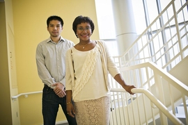 MIT professor Paula Hammond (right) and Bryan Hsu PhD' 14 have developed a nanoscale film that can be used to deliver medication, either directly through injections, or by coating implantable medical devices.
