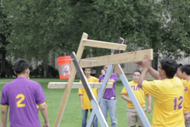 Pi Lambda Phi created a catapult for the Ice bucket challenge, which soaked President Reif a second time. 
