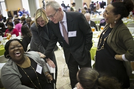 MIT president Rafael Reif and his wife Christine share a light moment with attendees at the MLK Jr. luncheon.