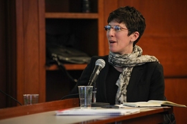 Julie Newman, MIT's director of sustainability, chaired the panel discussion.