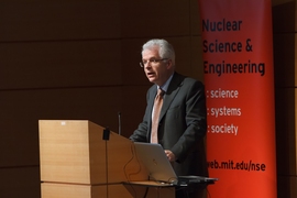 Richard Lester, head of MIT’s Department of Nuclear Science and Engineering, introduces Hansen.